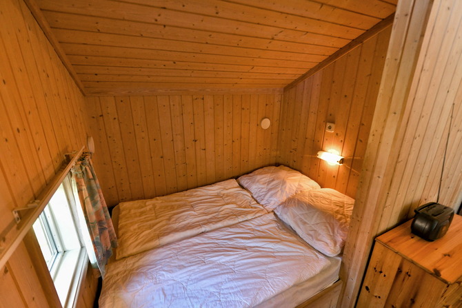 Ferienhaus in Pelzerhaken - Ferienhaus Typ D im Ferienpark AM WALDRAND - Alkovenbett im Wohnbereich