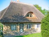 Ferienhaus in Döhnsdorf - Landhaus Unter dem Reetdach - Gartenansicht